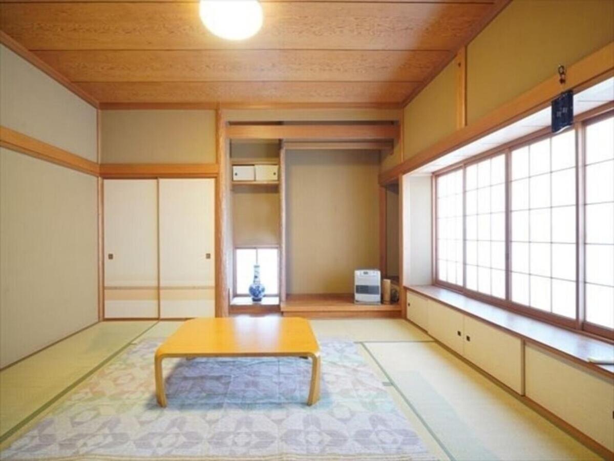 海と駅の近くのゲストハウス海悠 Ito  Bagian luar foto